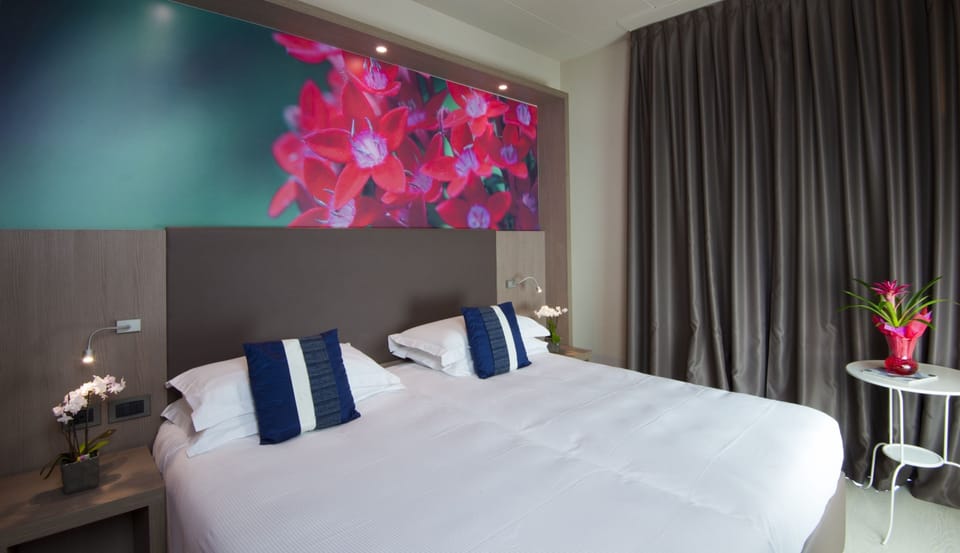 Premium bedding, down comforters, in-room safe, desk