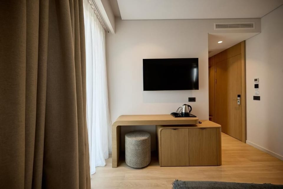 Superior Double Room, Balcony | Television