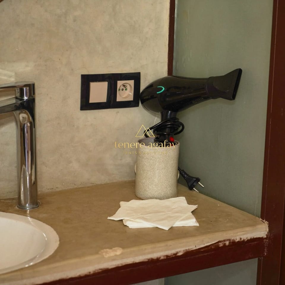 Separate tub and shower, towels, soap, shampoo