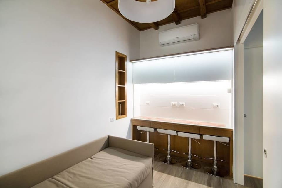 Deluxe Apartment, Kitchenette (Via Domenichino 5 - Rome) | Laptop workspace, soundproofing, iron/ironing board, free WiFi