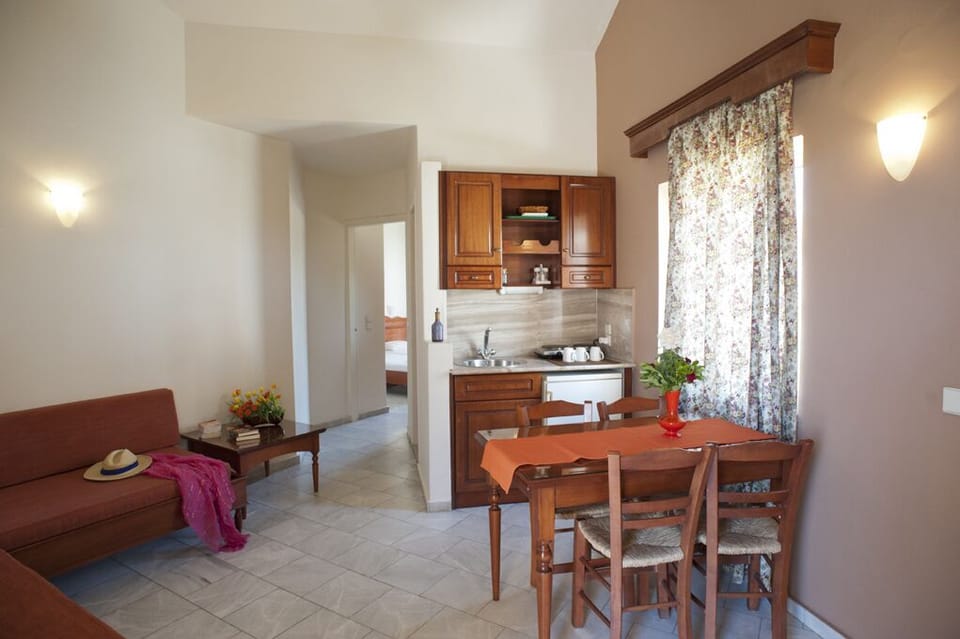 Family Apartment | Living area | 32-inch plasma TV with satellite channels, TV