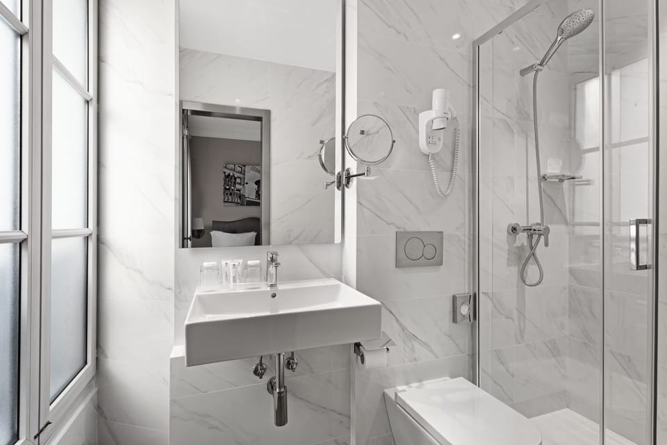 Double or Twin Room | Bathroom | Shower, eco-friendly toiletries, hair dryer, towels
