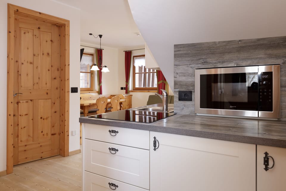Family Apartment, 2 Bedrooms | Private kitchen | Highchair