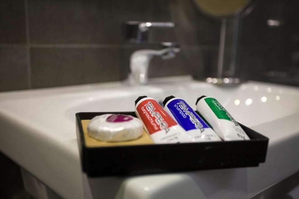 Triple Room, City View | Bathroom amenities | Free toiletries, hair dryer, slippers, bidet