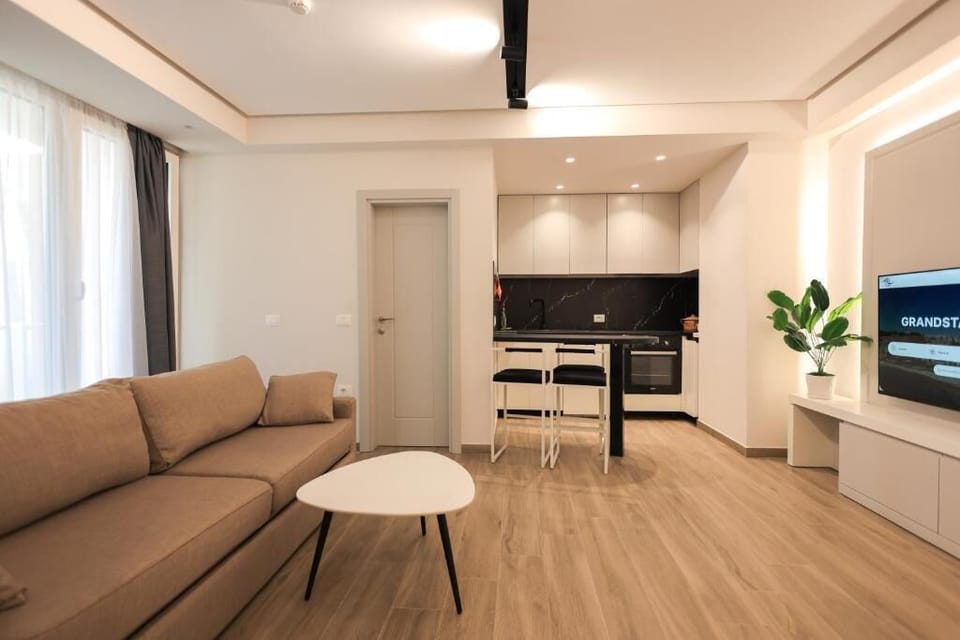 Superior Room, Balcony, Courtyard View | Living area | TV