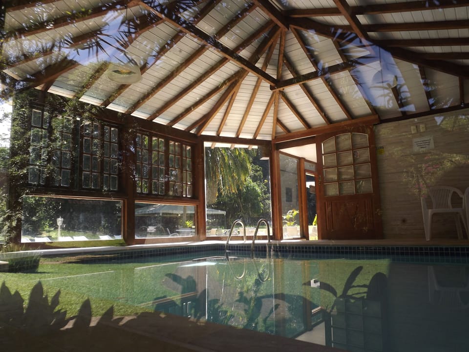 Indoor pool, outdoor pool, pool umbrellas, sun loungers