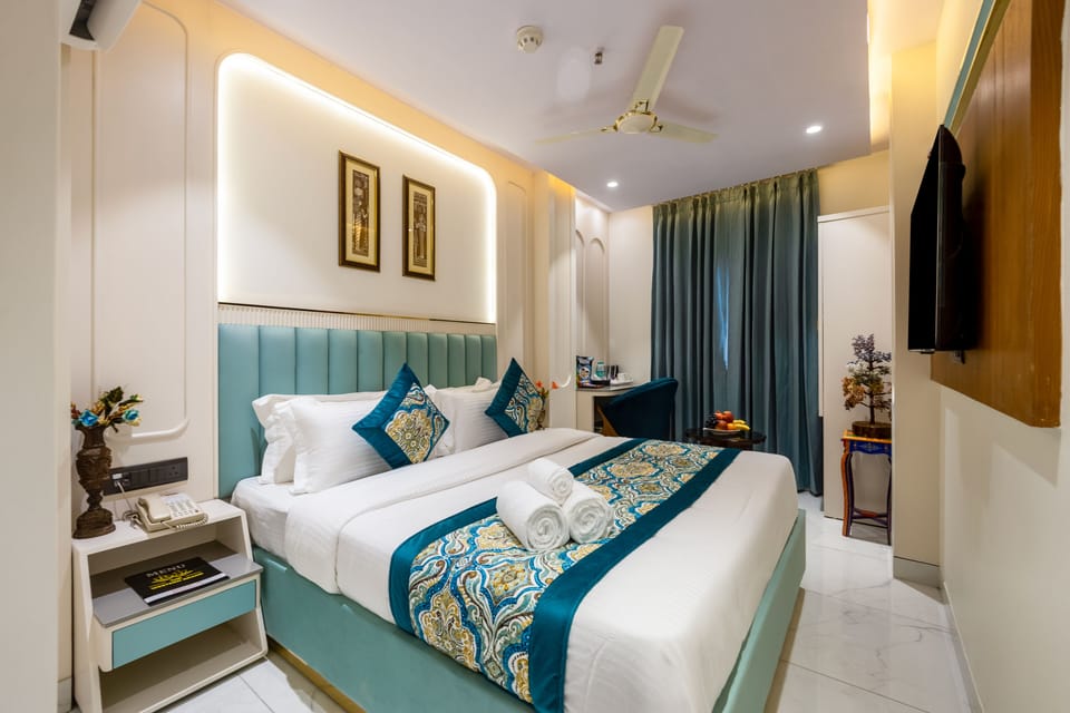 Deluxe Double Room | In-room safe, desk, laptop workspace, blackout drapes