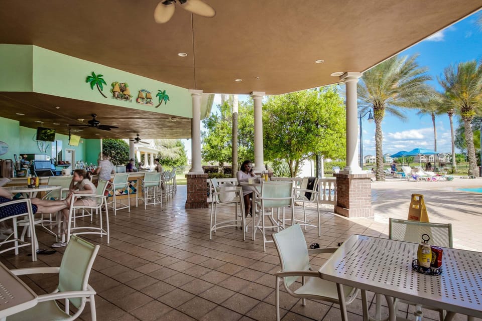 Condo, Multiple Beds, Pool Access, Garden View (Sunset Spectacular-Villas at Reunion) | Outdoor dining