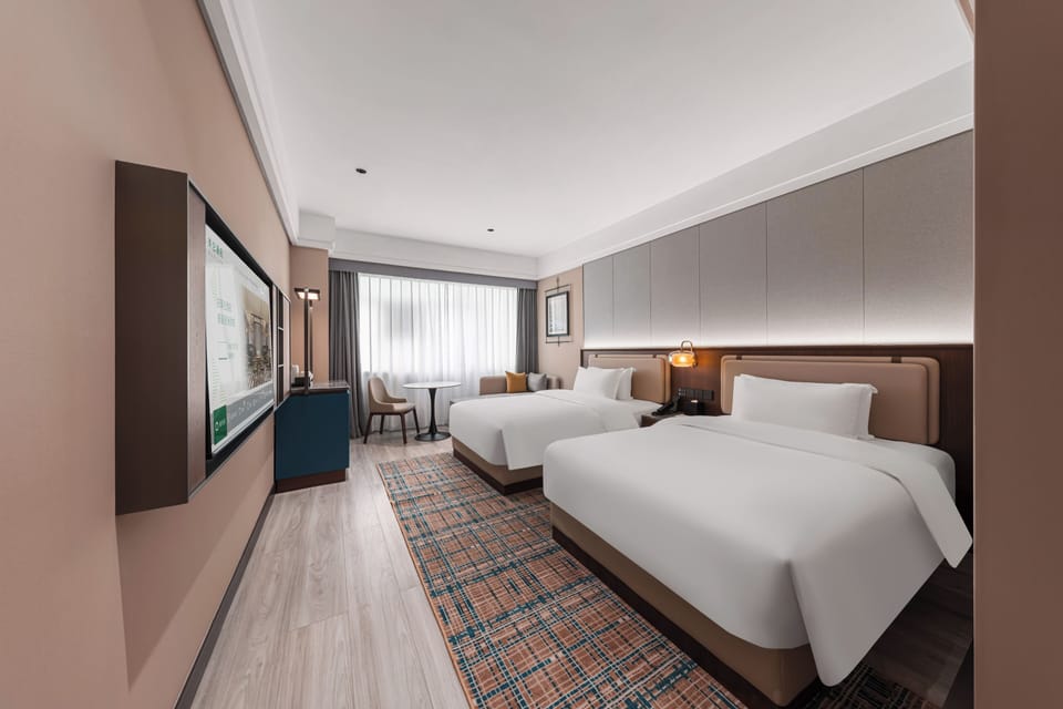 Classic Twin Room | Desk, laptop workspace, blackout drapes, iron/ironing board