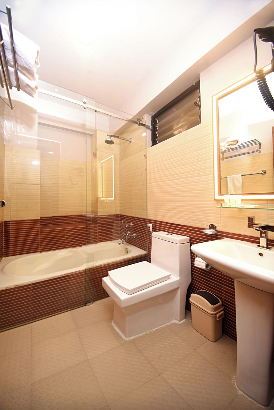 Shower, hair dryer, slippers, towels