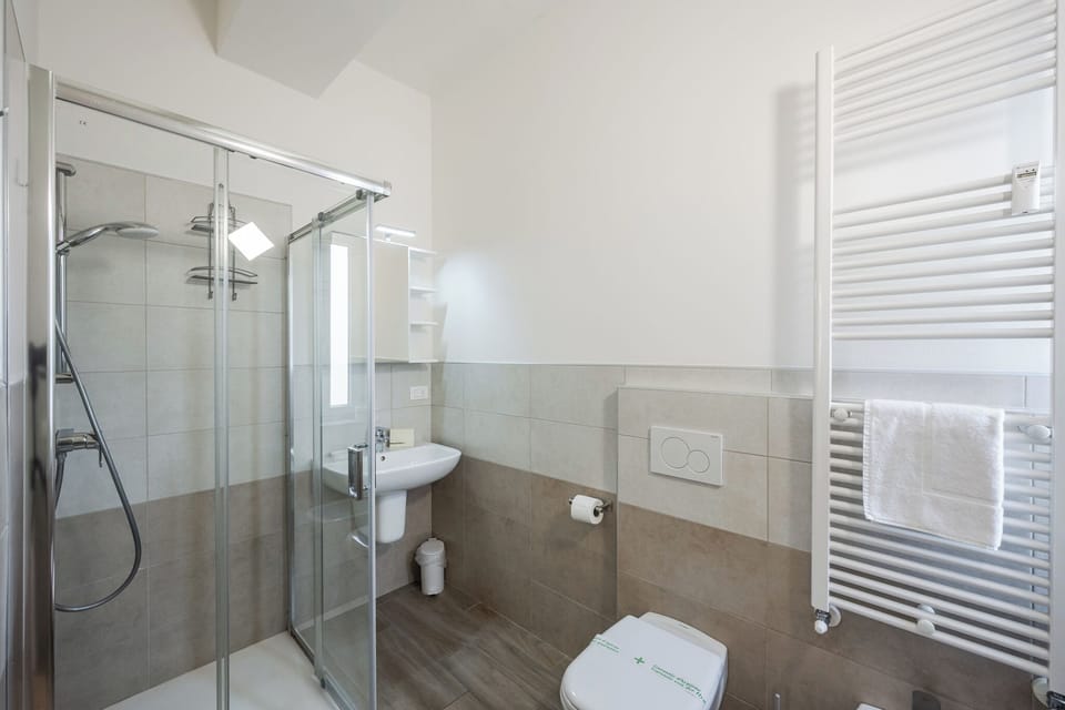 Townhome, 1 King Bed, Private Bathroom | Bathroom | Shower, hair dryer, towels, soap