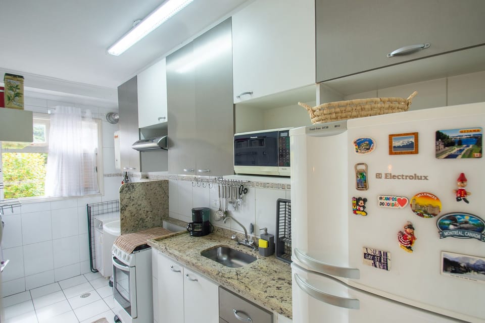 Apartment | Private kitchen | Espresso maker, full-size fridge, microwave, oven