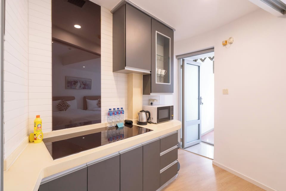 City View 2BR Serviced Residence - Comfortable Family Living | Private kitchenette | Fridge, microwave, rice cooker, cleaning supplies
