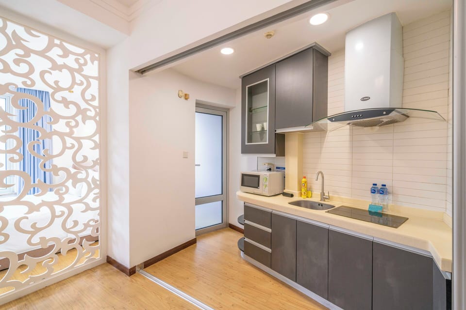 City View 1BR Serviced Residence - Spacious Living Room &amp; Kitchen | Private kitchenette | Fridge, microwave, rice cooker, cleaning supplies