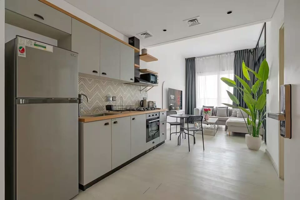 Condo, City View | Private kitchen | Full-size fridge, microwave, oven, stovetop