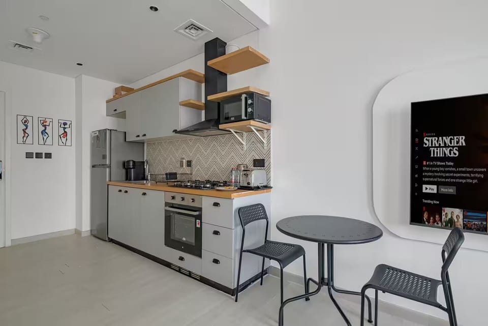 Condo, City View | Private kitchen | Full-size fridge, microwave, oven, stovetop