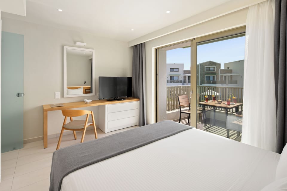 Premium Suite with sea view | In-room safe, blackout drapes, soundproofing, iron/ironing board