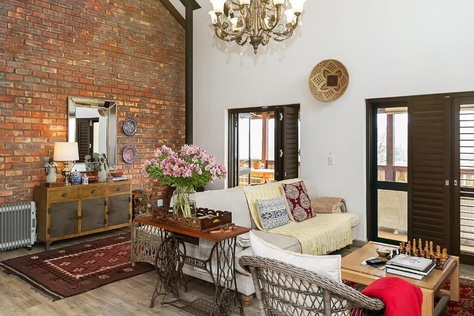 Deluxe Suite, Balcony, Mountain View | Living area | Printers