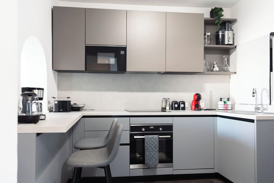 Comfort Apartment, Sea View | Private kitchen | Fridge, microwave, oven, stovetop