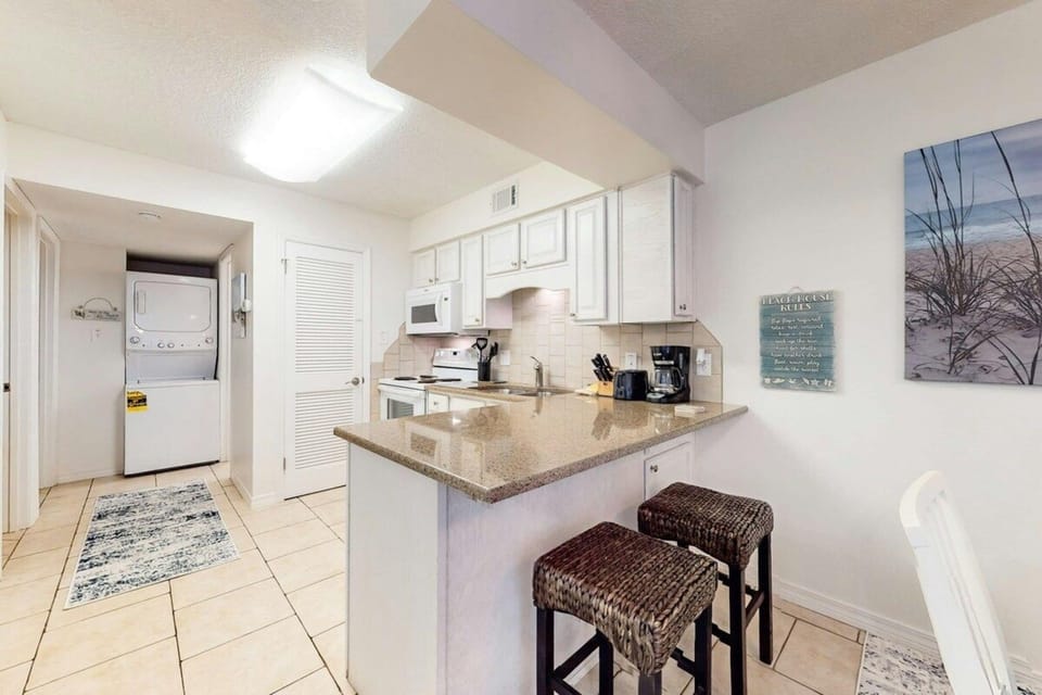 Signature Condo, 2 Bedrooms, Beachfront | Private kitchen | Fridge, microwave, oven, stovetop