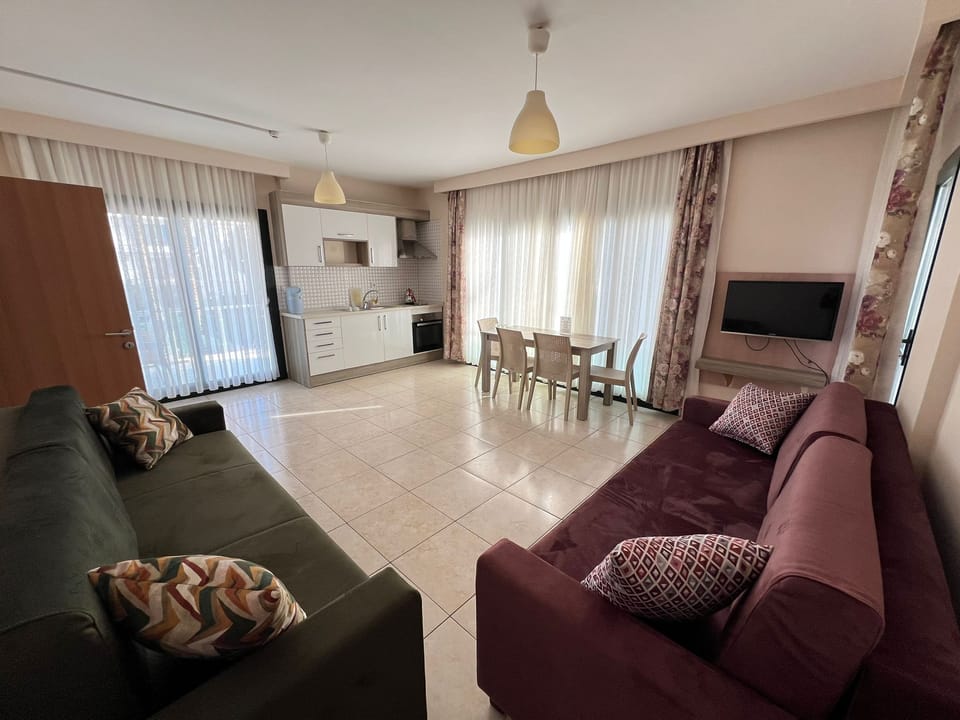 Family Apartment, Balcony, Sea View | Living area