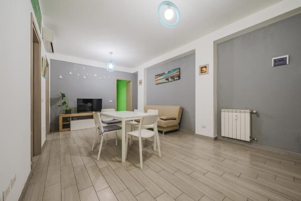 Superior Apartment | Living area | Flat-screen TV