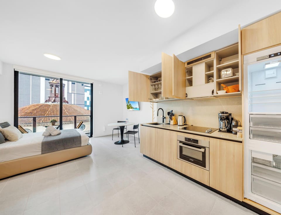 Studio, Balcony, City View | Private kitchen | Fridge, microwave, oven, dishwasher