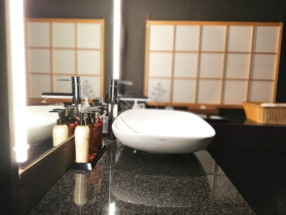 Japanese Suite with Private Open-air Bath (Japanese Cypress Bath) | Bathroom | Separate tub and shower, spring water tub, designer toiletries