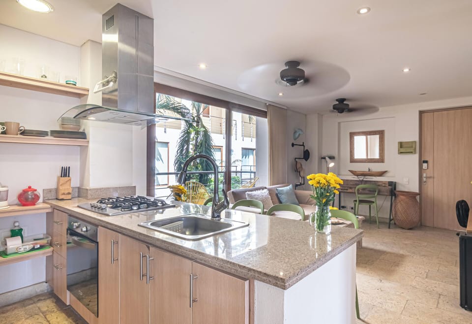 Apartment, Garden View | Private kitchen | Coffee/tea maker, fridge, microwave, oven