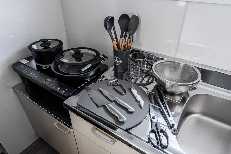 Apartment | Private kitchen | Fridge, microwave, stovetop, cookware/dishes/utensils