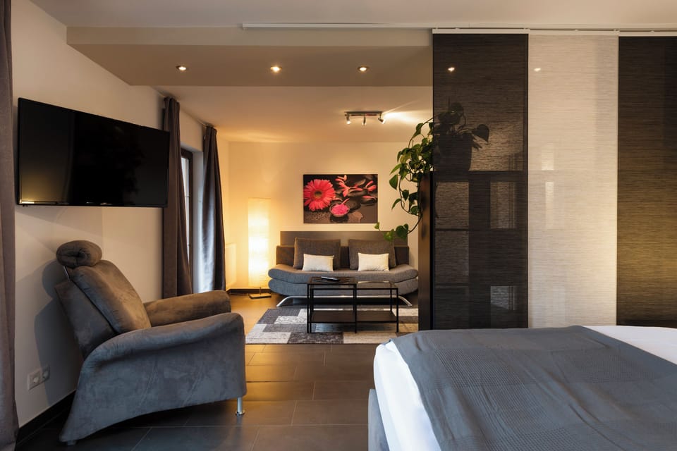 Superior Apartment, 2 Bedrooms, Kitchen | Living area | 35-inch flat-screen TV with satellite channels