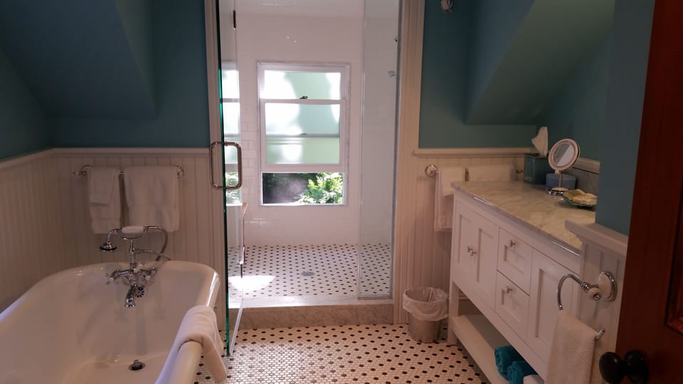 Studio Suite | Bathroom | Designer toiletries, hair dryer, bathrobes, towels