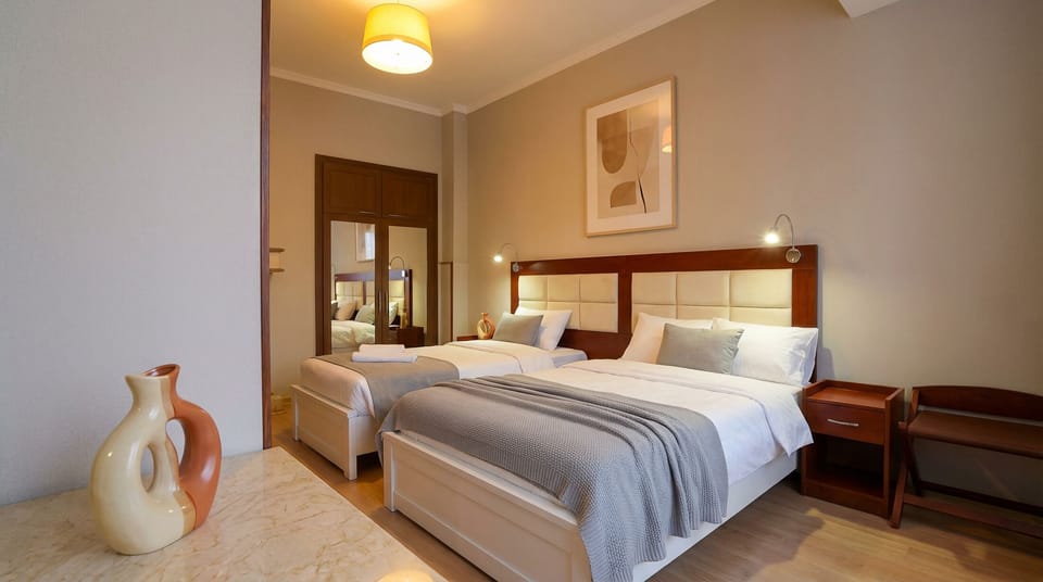 Comfort Twin Room, Courtyard View | In-room safe, blackout drapes, soundproofing, iron/ironing board