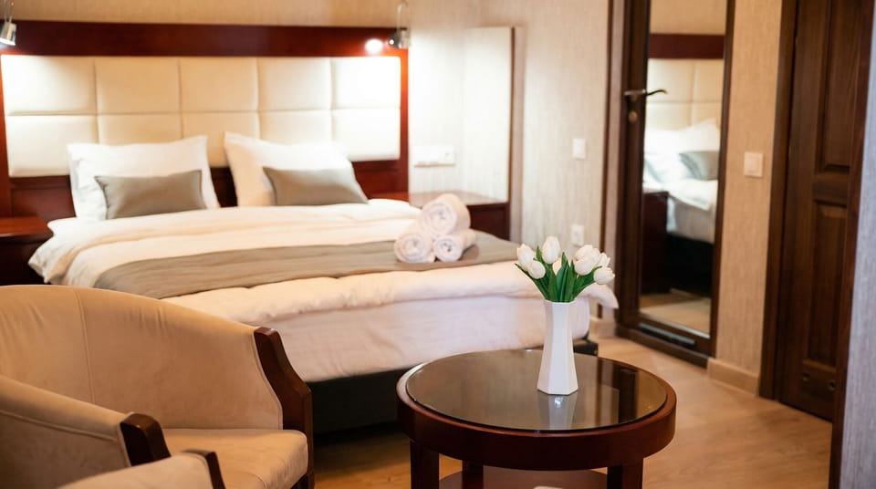 Comfort Double Room, City View | In-room safe, blackout drapes, soundproofing, iron/ironing board