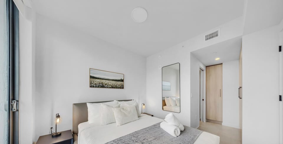 Condo, Balcony, City View | Premium bedding, blackout drapes, iron/ironing board, free WiFi