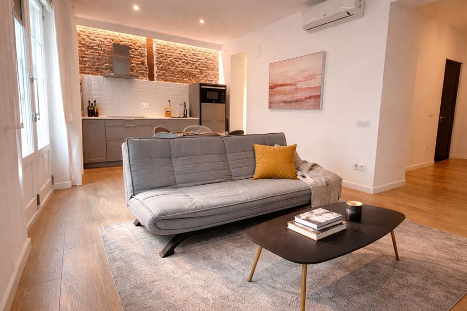 Panoramic Apartment | Living area | Flat-screen TV