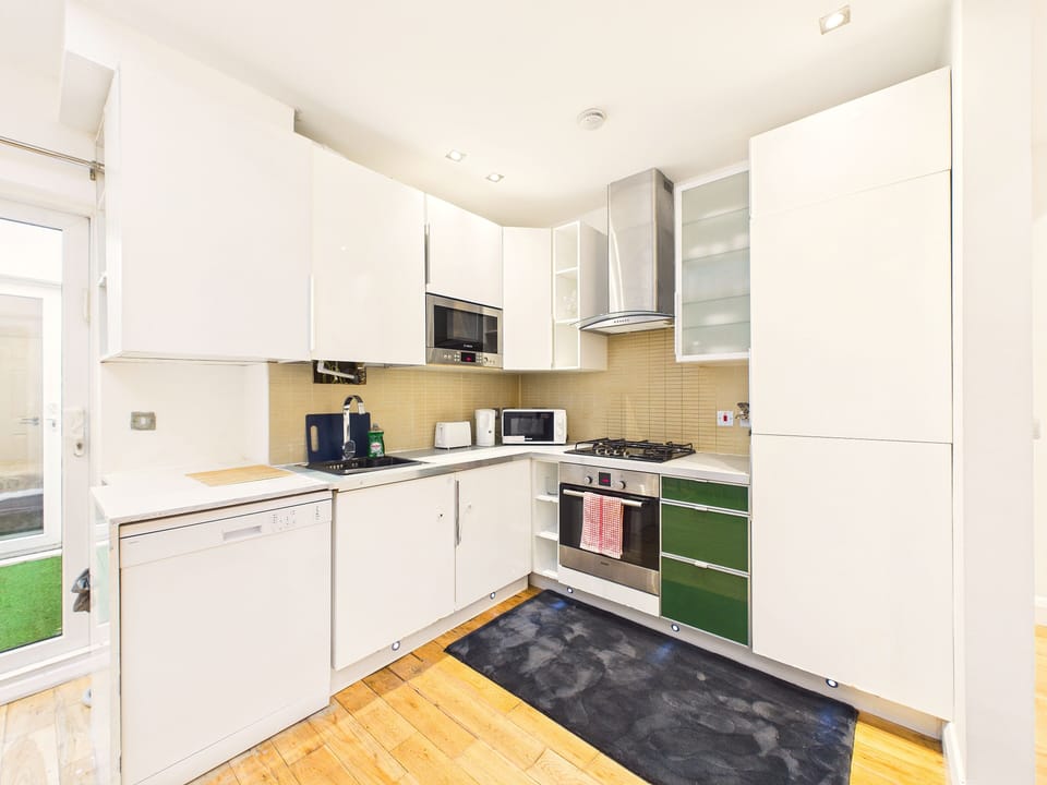 Comfort Apartment, Patio, Garden Area | Private kitchen | Full-size fridge, microwave, oven, stovetop