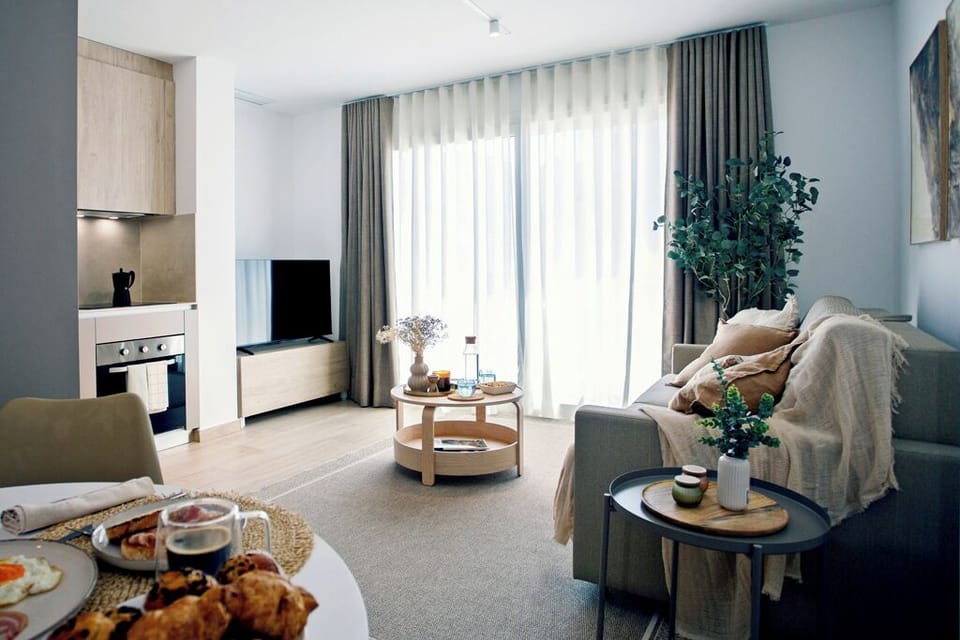 Family Apartment, Balcony | Living area | Flat-screen TV