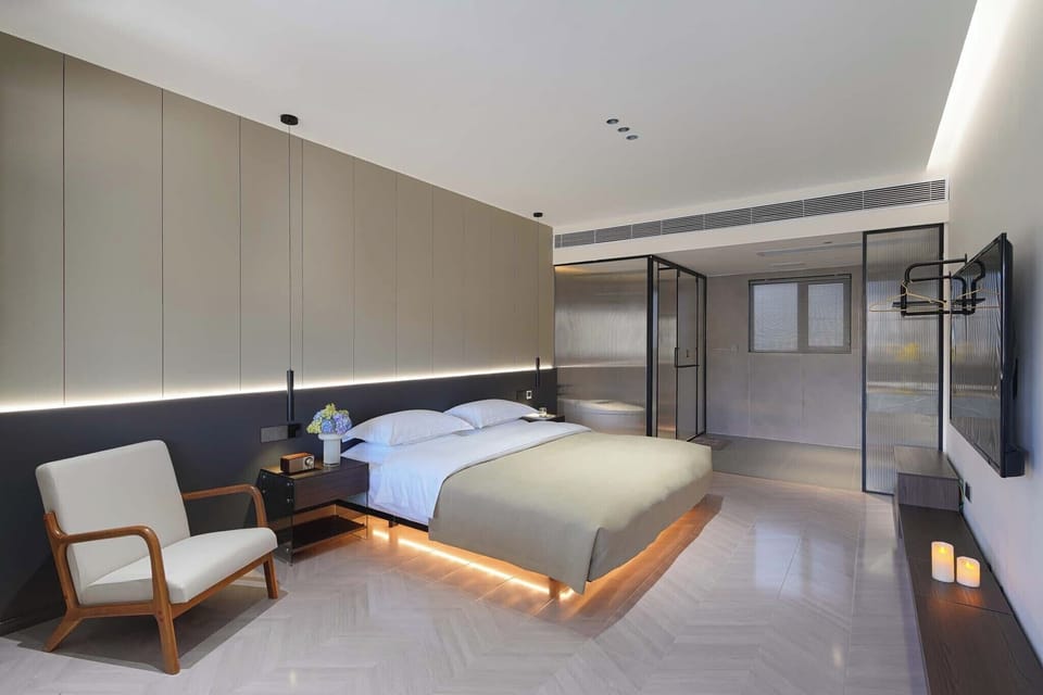 Senior Double Room, Courtyard View | Living area | 50-inch LCD TV with digital channels