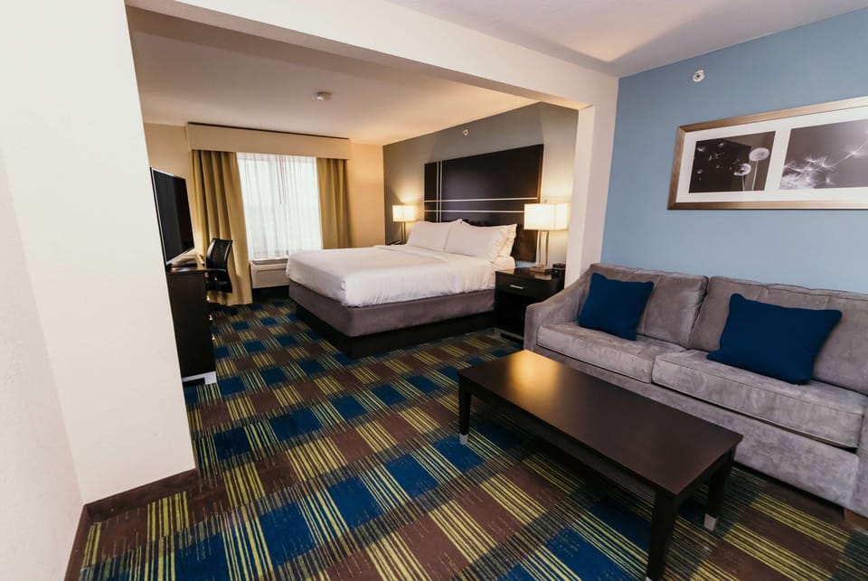 Suite, 1 King Bed with Sofa bed, Non Smoking (Mobility) | In-room safe, desk, laptop workspace, iron/ironing board