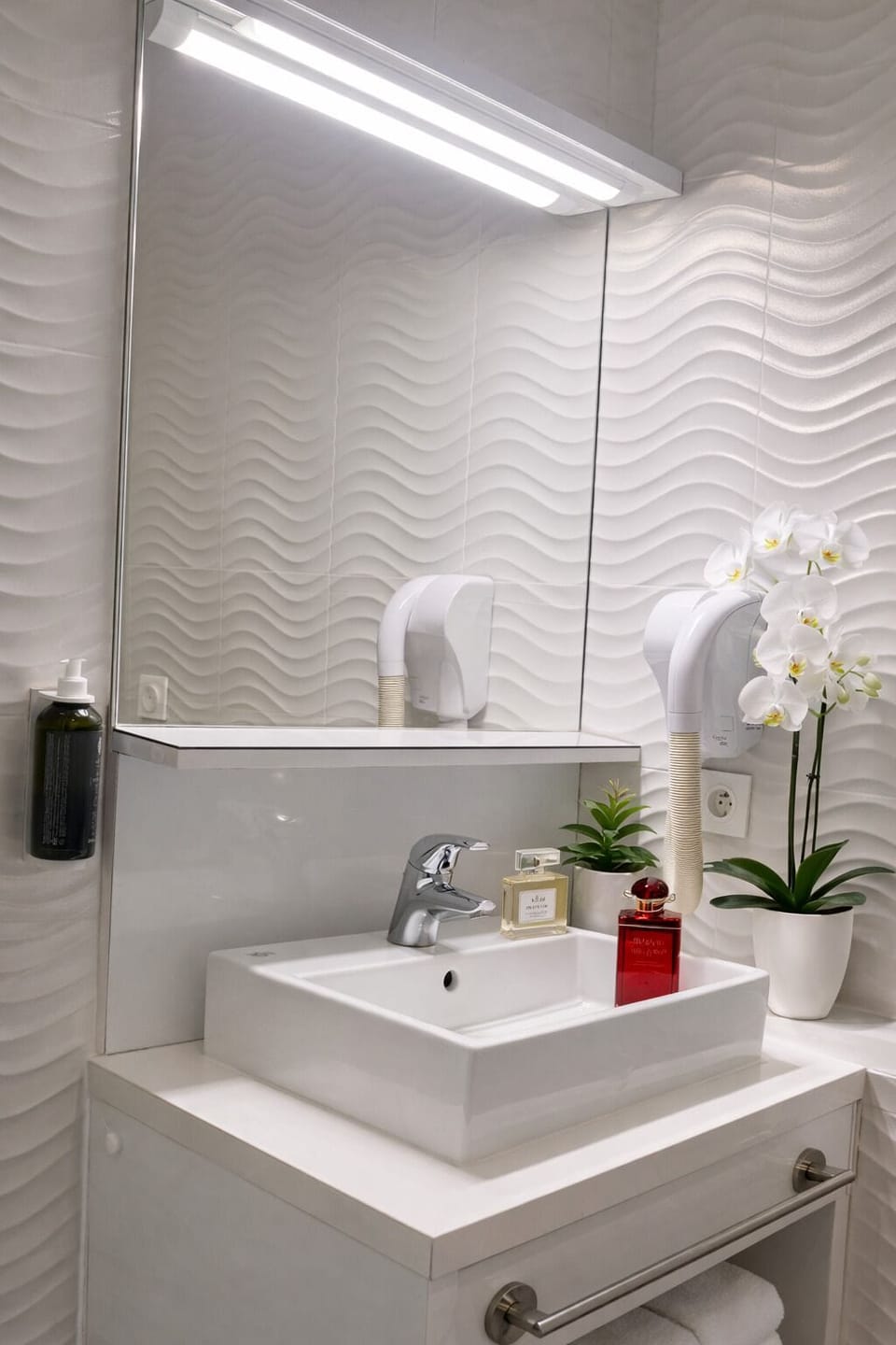 Hair dryer, towels, soap, shampoo