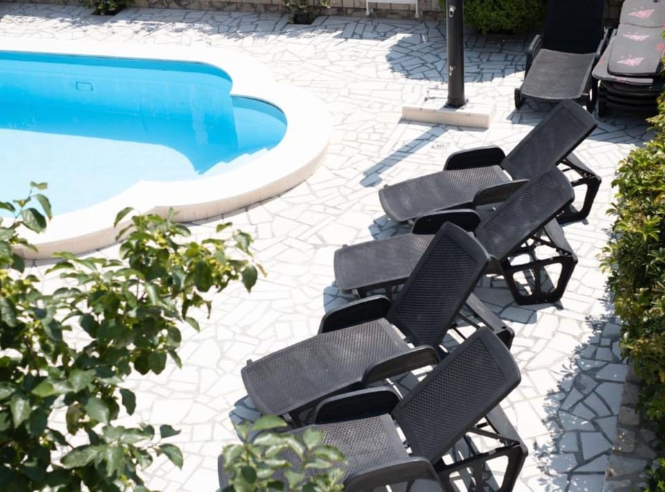 House (Four Bedroom Holiday Home with Terrac) | Outdoor pool | Seasonal outdoor pool