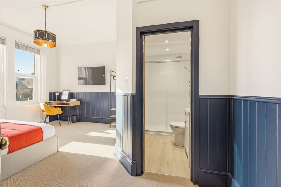 Deluxe Room | Desk, laptop workspace, iron/ironing board, free WiFi