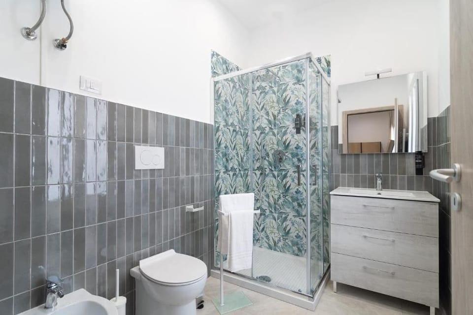 Double Room | Bathroom | Shower, free toiletries, towels, soap