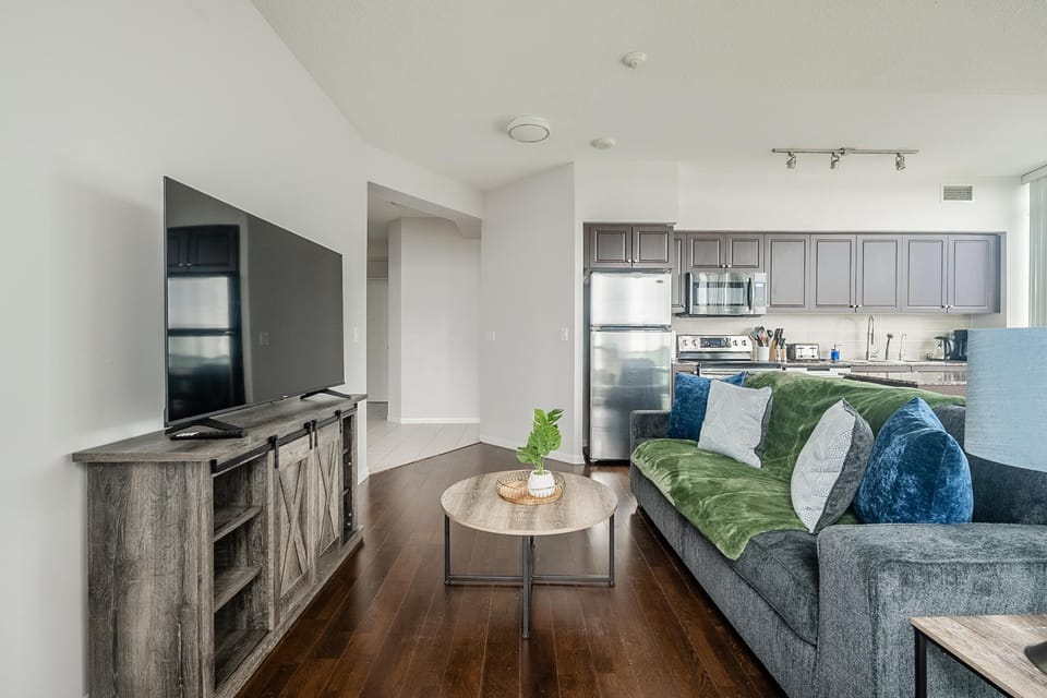 Family Suite | Living area | 50-inch flat-screen TV with digital channels