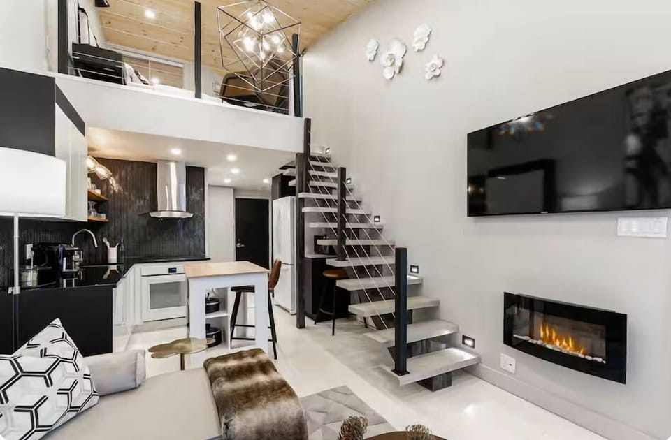Apartment, Balcony, Mountain View | Living area | Flat-screen TV