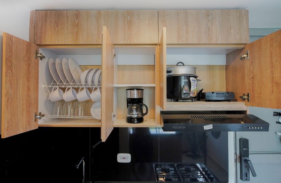 Deluxe Apartment, Balcony, Mountain View | Private kitchen | Coffee/tea maker, rice cooker, griddle, cookware/dishes/utensils