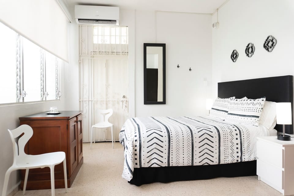 Room, 1 Queen Bed (Suite 3) | In-room safe, individually decorated, individually furnished