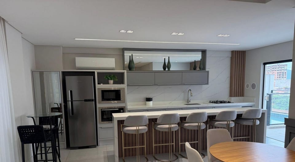 Deluxe Apartment, Pool Access, Beach View | Private kitchen | Fridge, microwave, cookware/dishes/utensils
