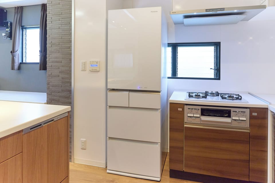 Apartment | Private kitchen | Fridge, microwave, stovetop, cookware/dishes/utensils